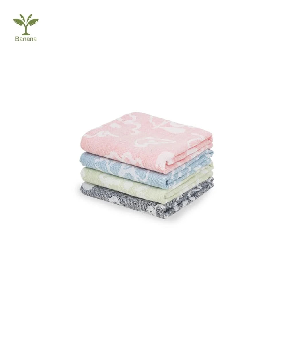 Stack of colorful baby blankets on a white background with Banana brand logo.